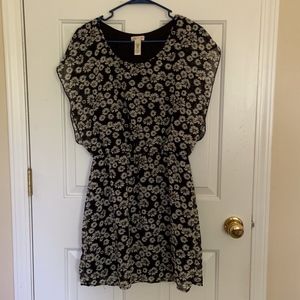 Black dress with daisy print